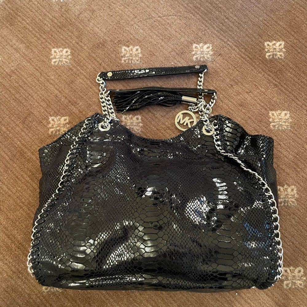 Michael Kors black leather handbag.